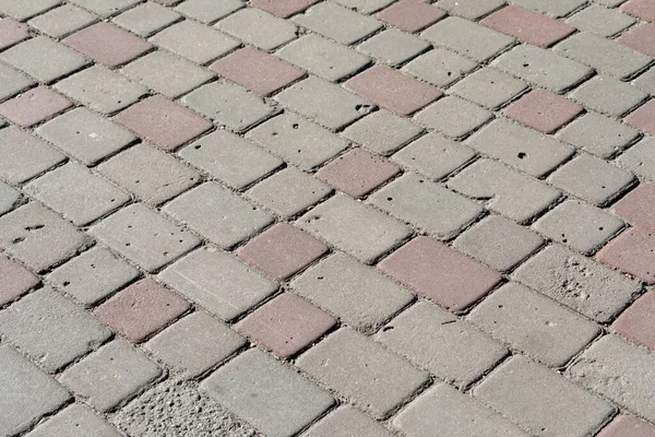 背景の色のついた石畳の質感 歩道のコンクリート舗装 — ストック写真