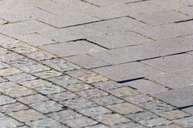 Güneşli bir günde arka planlar ve dokular için beton kaldırım