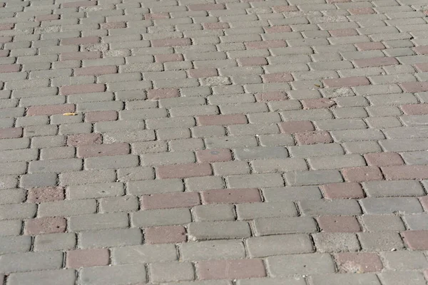 背景のための地面に色の石畳のテクスチャ — ストック写真