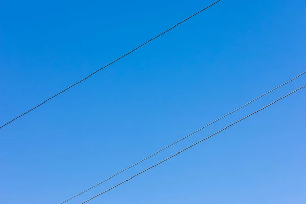 Linie Energetyczne Tle Błękitnego Nieba — Zdjęcie stockowe