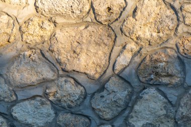 Arka planlar için taş ve beton çit duvarı