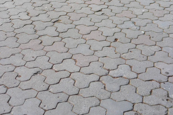 公園内の灰色コンクリート舗装の質感 — ストック写真