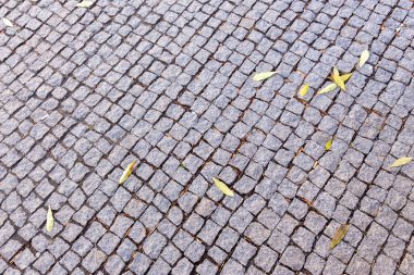 Arkaplan için siyah granit kaldırım taşlarının dokusu