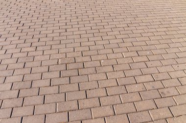 Parktaki güneşli arka planlar için asfaltın dokusu