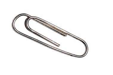 Beyaz arka planda metal ataç. Makro ataç atışı.