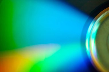 Küçük bir diskin yanardöner yüzeyinin ayrıntıları. Renklerin eğimleri.