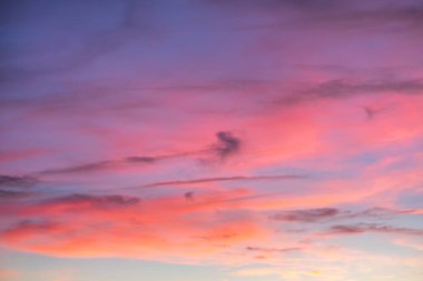Sky on fire with glowing clouds at sunset. France, Europe.