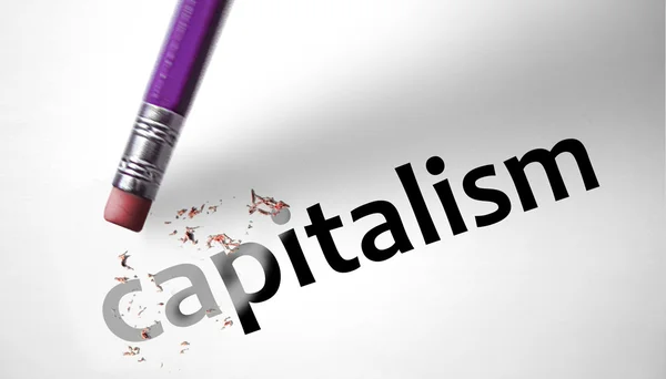 Borrador que borra la palabra capitalismo — Foto de Stock