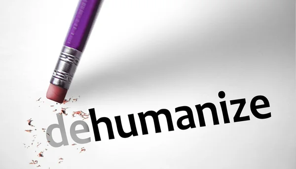 Eraser changing the word Dehumanize for Humanize — Stock Photo, Image