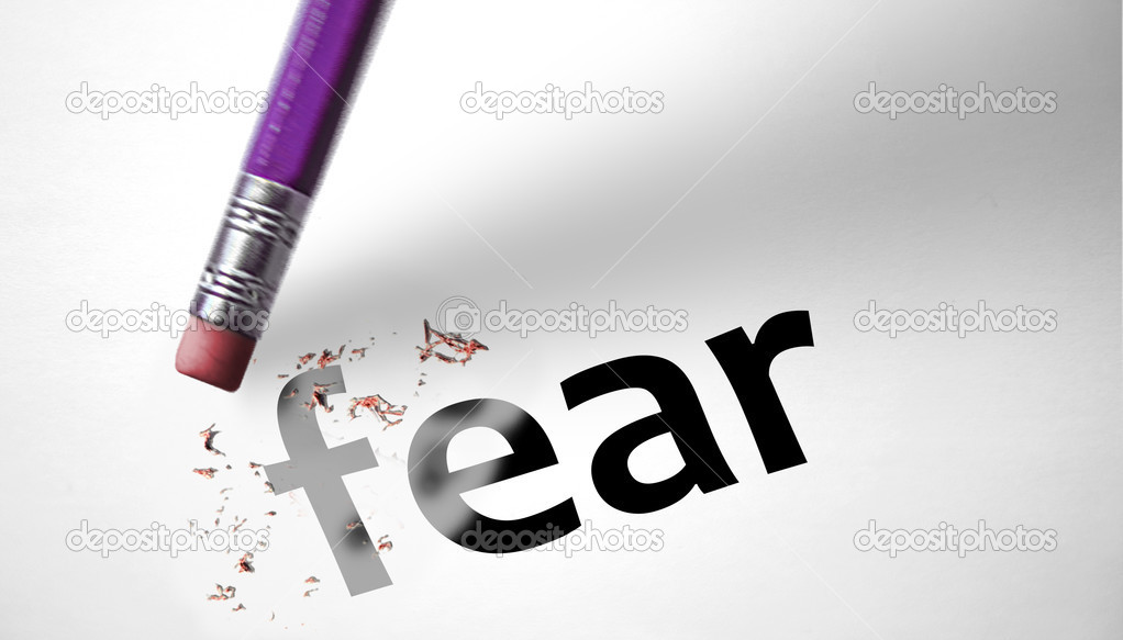 Eraser deleting the word Fear 