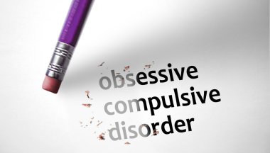 Eraser deleting the concept Obsessive Compulsive Disorder, OCD.  clipart