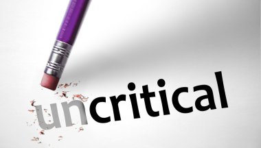 Eraser changing the word Uncritical for Critical  clipart
