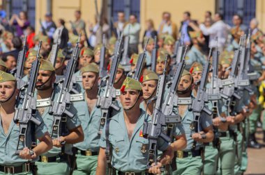MALAGA, SPAIN - APRIL 09: Spanish Legionarios march on a militar clipart