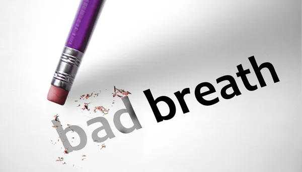 Eraser deleting the words Bad Breath — Stock Photo, Image
