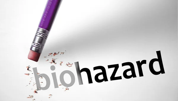 Borrador que borra la palabra Biohazard — Foto de Stock