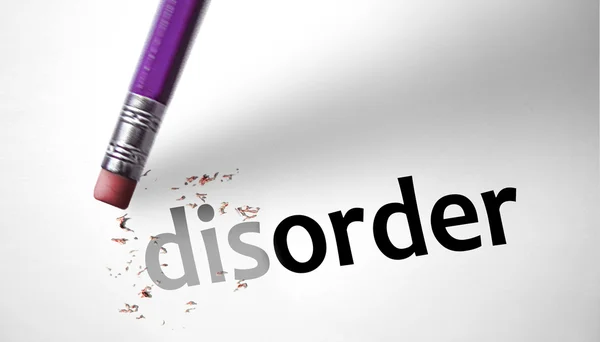 Eraser deleting the word Disorder — Stock Photo, Image