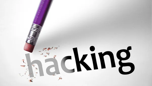 Eraser deleting the word Hacking — Stock Photo, Image