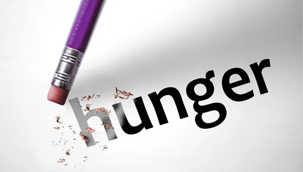 Eraser deleting the word Hunger — Stock Photo, Image