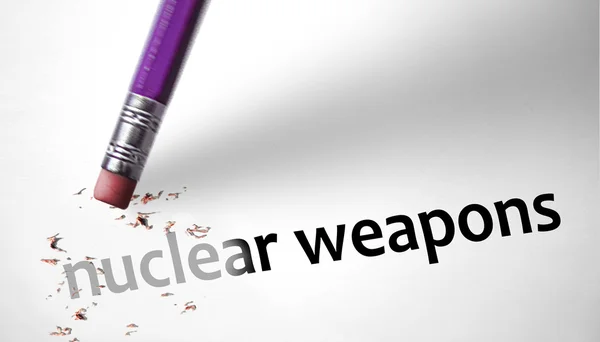 Eraser deleting the concept Nuclear Weapons — Stock Photo, Image