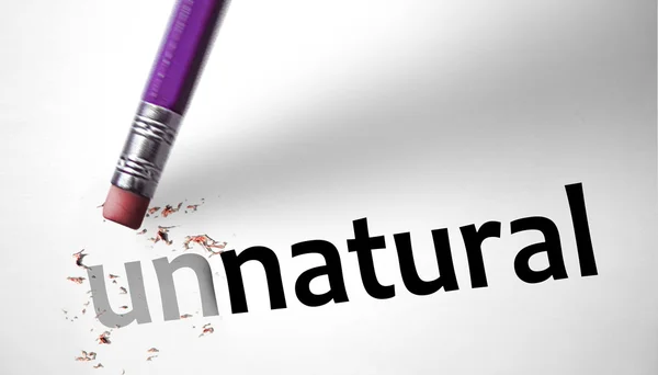 Eraser changing the word Unnatural for Natural — Stock Photo, Image