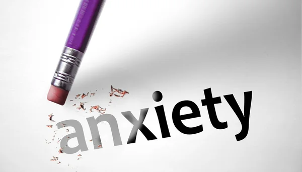 Eraser deleting the word Anxiety — Stock Photo, Image