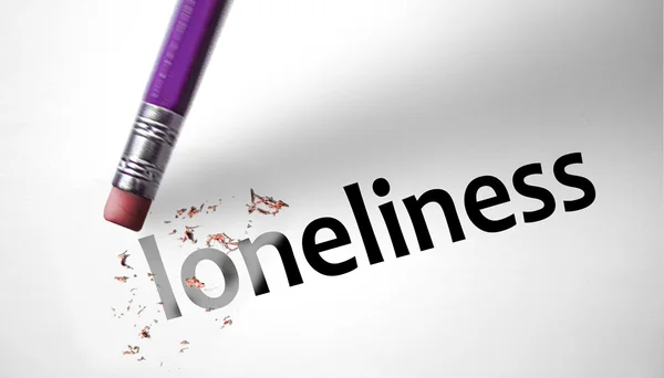 Eraser deleting the word Loneliness — Stock Photo, Image