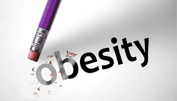 Radiergummi löscht das Wort Fettleibigkeit — Stockfoto