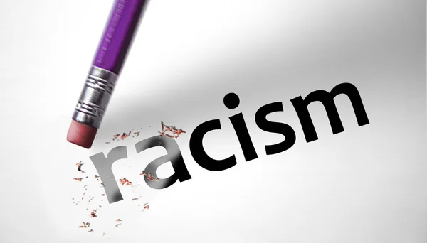 Eraser deleting the word Racism — Stock Photo, Image