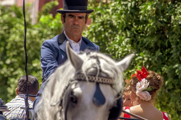 MALAGA, SPAIN - AUGUST, 14: Horsemen and carriages at the Malaga August Fair on August, 14, 2009 in Malaga, Spain — Stock Photo, Image