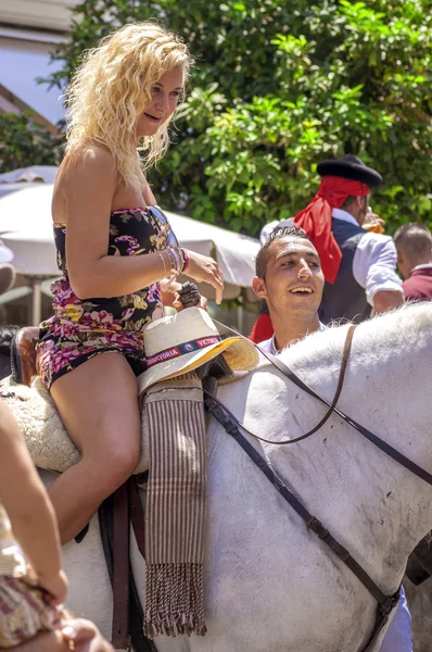 MALAGA, SPAIN - AUGUST, 14: Horsemen and carriages at the Malaga August Fair on August, 14, 2009 in Malaga, Spain — Stock Photo, Image