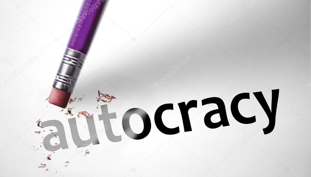 Eraser deleting the word Autocracy 