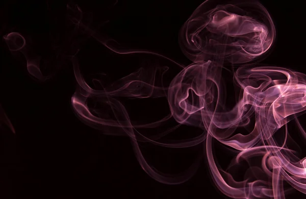 Rök på svart bakgrund Stockbild