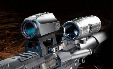 Magnifier swung out of the red dot's way on a modern sporting rifle