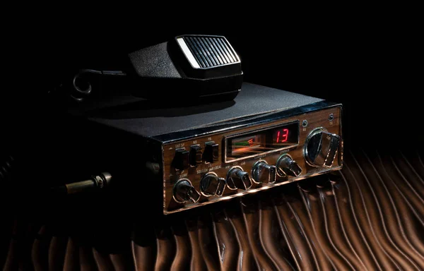 Sideband CB radio and microphone tuned into channel 13