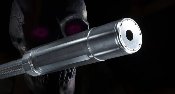 Skull with purple eyes behind a suppressor