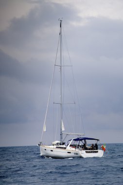 Sailing yacht at sea clipart