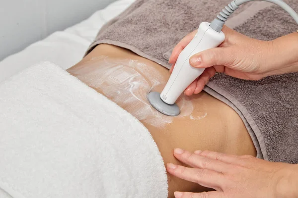 Woman doing lipo at the beautician. Spa concept