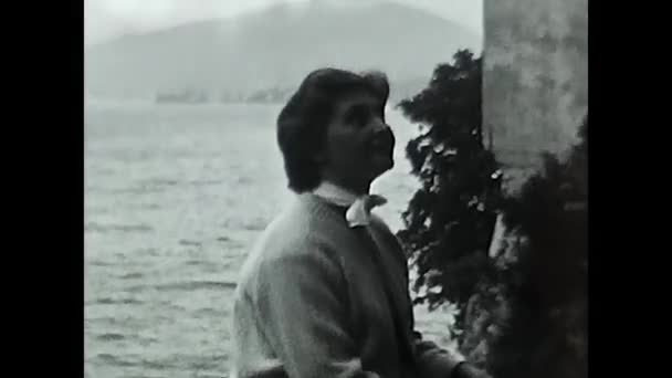 Valle Aosta Italy June 1950 1950S Lake Shore Woman Black — стоковое видео