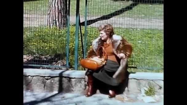 Florence Italy May 1960 Woman Sitting Wall Fur 60S — Stock Video
