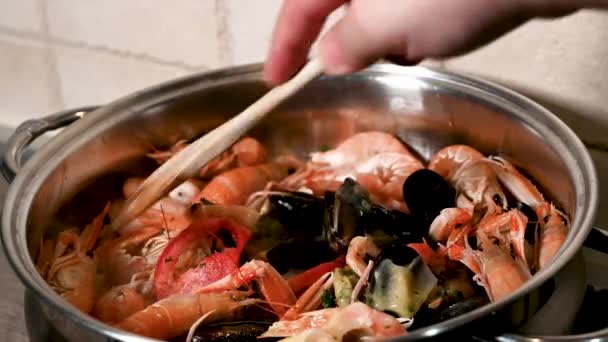 Man Cooks Fish Soup Mixes Mix While Cooking — Stock videók