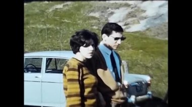 lake of the jump, Italy January 1960 : people and man with a pipe in the 60s