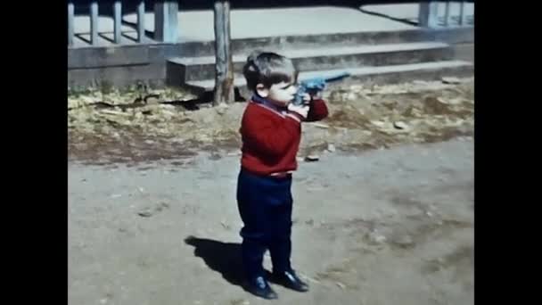 Lake Jump Italy January 1960 Child Toy Gun Western Setting — Stok Video