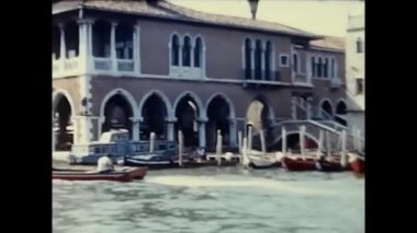 Venice, Italy March 1960: glimpse of venice with moving boats in the 60s