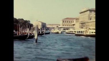 Venice, Italy March 1960: glimpse of venice with moving boats in the 60s