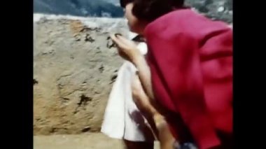 ravello, naples june 1960: mother and daughter kiss and are happy in the 60s
