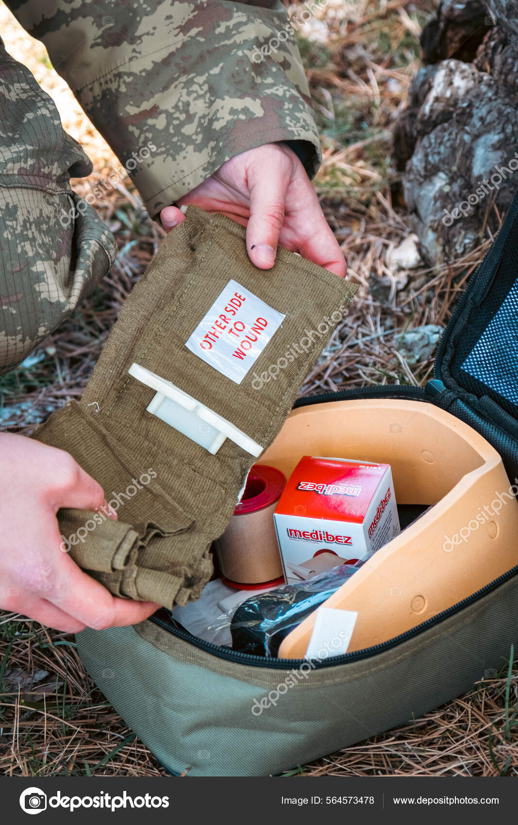 Military Army First Aid Kit Camouflaged Soldier Medic Stock Photo by
