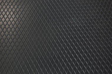 Siyah metal desenli çelik arka plan. Delinmiş metal levha.