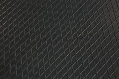 Siyah metal desenli çelik arka plan. Delinmiş metal levha.