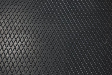 Siyah metal desenli çelik arka plan. Delinmiş metal levha.