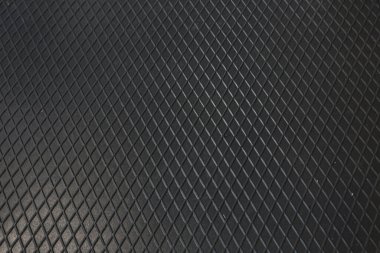 Siyah metal desenli çelik arka plan. Delinmiş metal levha.